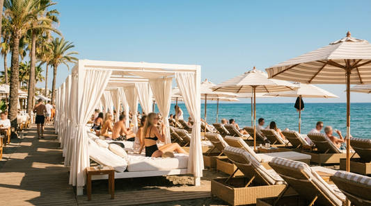 Luxury Bali day beds at a Marbella beach club by the sea