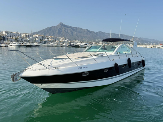 Fairline Targa 48 GT yacht docked in Puerto Banús with La Concha in the background