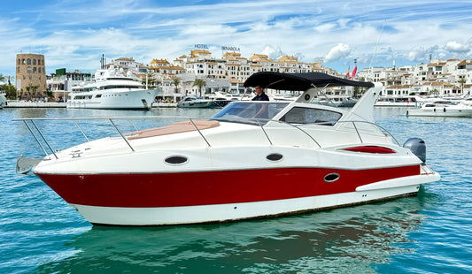 MOA Platinum 32 yacht docked in Puerto Banús with captain onboard